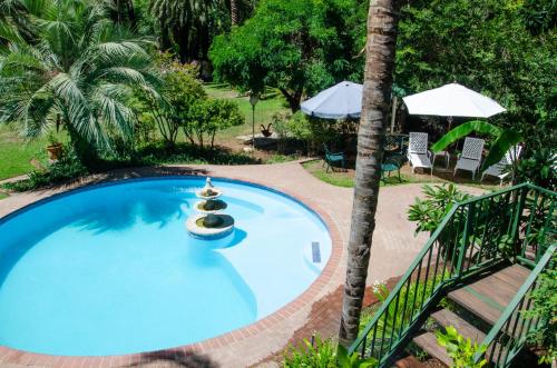 Three Gables Guesthouse – Upington, NM