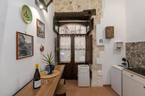 Kitchen, Casa Ariadne by Ortigia Apartments in Syracuse