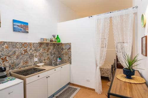Kitchen, Casa Ariadne by Ortigia Apartments in Syracuse