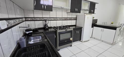 virtuve, Apartamento Praça da Bíblia (Apartamento Praca da Biblia) in Bom Jesus da Lapa