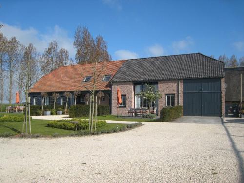 Rural holiday home with outdoor pool & sauna