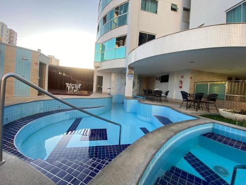 Úszómedence, Apartamento confortavel em caldas novas com espaco aquatico, 6 piscinas , 3 hidromassagem , Bar e Re in Bandeirantes