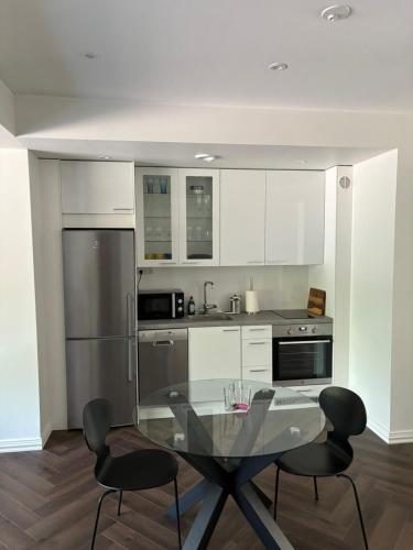 Kitchen, Unique apartment on the prestige address in Ullanlinna