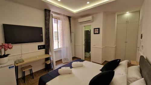 Susy's Guest House - Room Colosseo, Řím (fotografie 10)