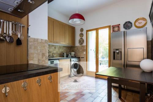 Kitchen, Maison avec clim, jardin et parking Aiguelongue in Saint-Eloi