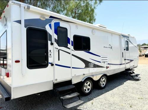 Rooms in Modern RV Trailer Home - Tap to explore photos