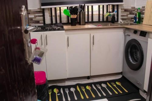 Kitchen, COZY and EXOTIC 3 BED 2 BATH WITH 24HRS LIGHT AND 20 MINS TO AIRPORT in Ifako Agege