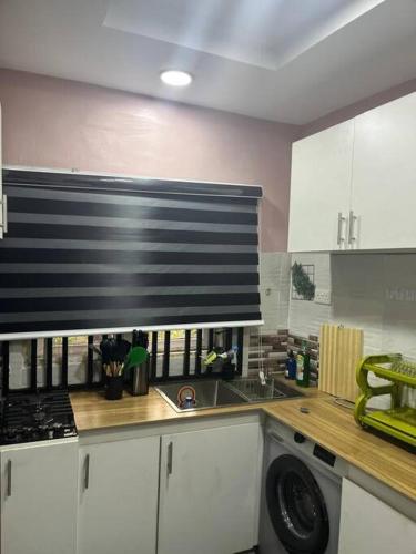 Kitchen, COZY and EXOTIC 3 BED 2 BATH WITH 24HRS LIGHT AND 20 MINS TO AIRPORT in Ifako Agege
