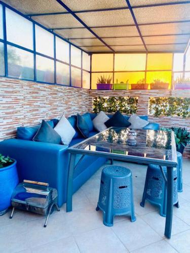 Bel appartement Au centre ville, internet Fibre, canal plus, chaines internationales in El Massira