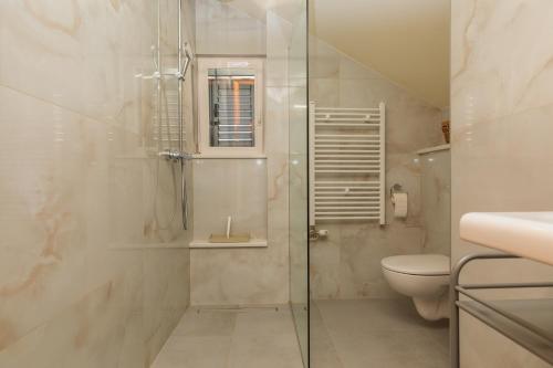 One-Bedroom Apartment with Balcony and Sea View image 10