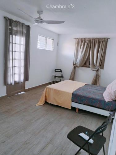 Haut de villa creole, vue sur mer in Baillif