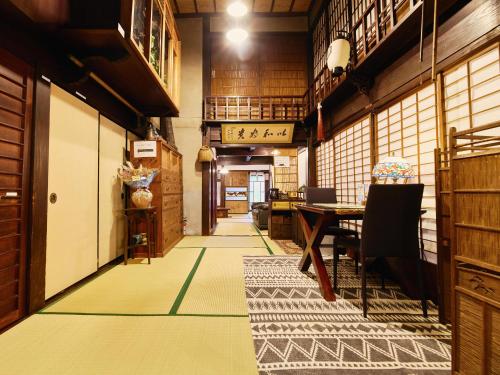 Shared lounge/TV area, 以久波別邸虎屋 in Ukiha