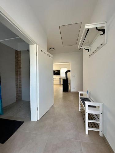 4 Zimmer im Neubau Bungalow, Garten, Grillen, bis 9 Personen 4 Zimmer im Neubau Bungalow, Garten, Grillen, bis 9 Personen