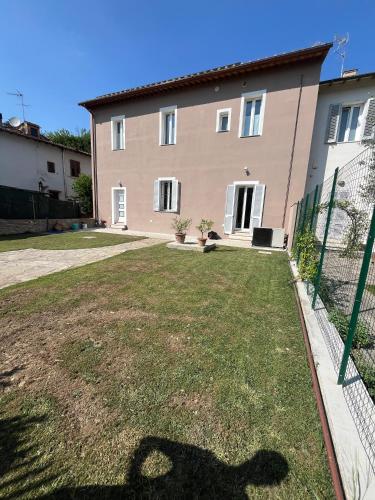 Kert, Casa nel borgo di Capraia in Capraia E Limite