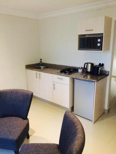 Kitchen, The Milkwood Beach Apartments in Isipingo