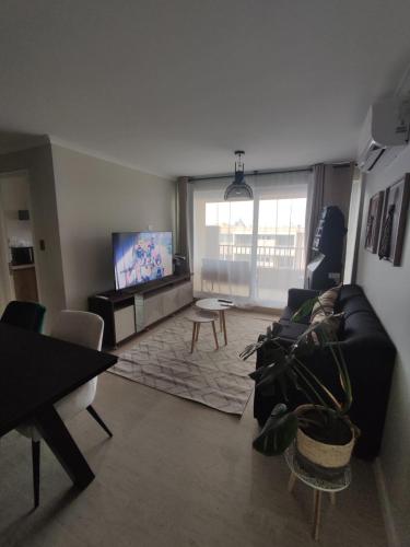 Koplietošanas atpūtas telpa ar TV, Hermoso y equipado Departamento con wifi y aire acondicionado in Mačali