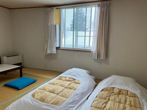 Japanese-Style Room with Shared Bathroom image 2