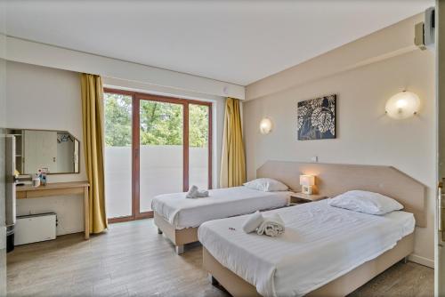 Room in Apartment - Value Stay Brussels South - Comfort Studio - Twin chambre d'hôte Waterloo