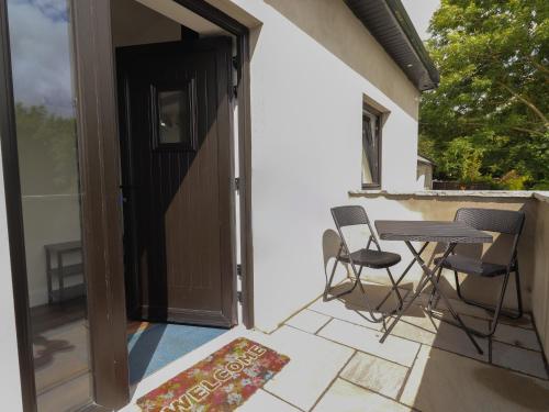 Зовнішній вигляд готелю, Hogans Cottage in Еністімон