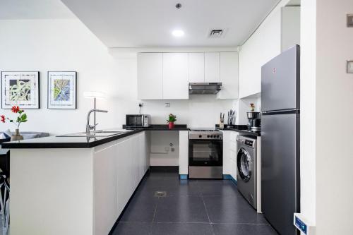 Serenity Living - stunning 1BR, DAMAC Hills, Dubai (Foto 7)