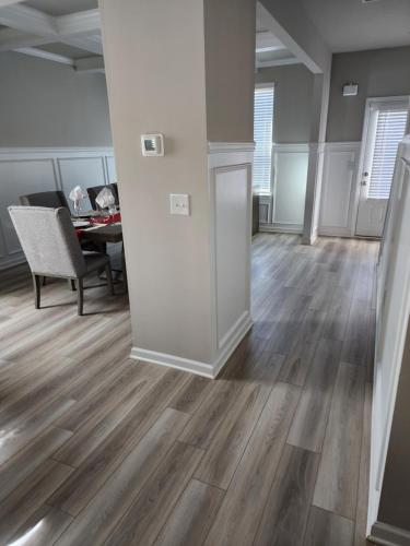 Charming Serenity Awaits The Zebra & Coffee Suites - Dual Queen Bedrooms with Exclusive Comforts, Open Quartz Kitchen, and Lush Patio Near Shopping Bliss in Locust Grove, USA