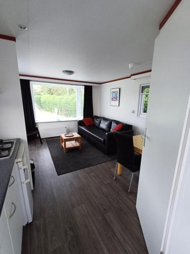 Chalet dichtbij zee en duinen in ฮีมซเกิร์ก