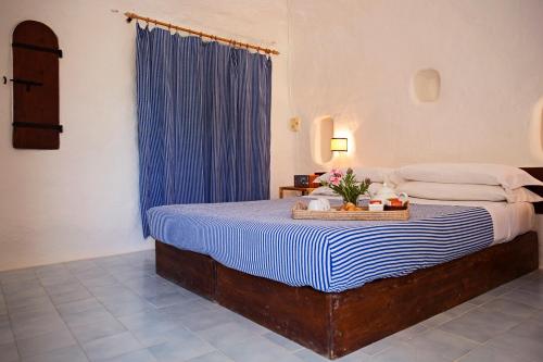 Albergo I Dammusi Di Borgo Cala Creta - Tap to explore photos