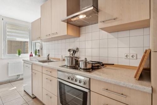 Konyha, Komfortwohnung nahe Basel mit Parkplatz in Binzen