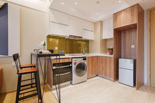 주방, 래플스 이그제큐티브 아파트먼트 (Raffles Executive Apartment) in 톈허 구