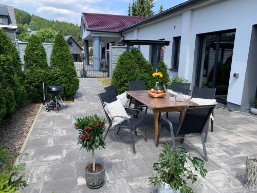 花園, Ferienwohnung Körperzeit (Ferienwohnung Korperzeit) in 勞莎