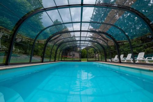 景觀, Villa with pool, sauna, pergola, park, and playground in 史禾博達納德烏普
