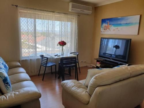 Közös társalgó / TV, Beach side holiday apartment in West Lakes