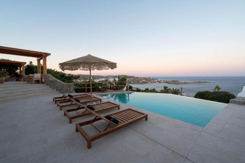 Nomade Villa 4BR over Psarou beach – khách sạn tại Psarou