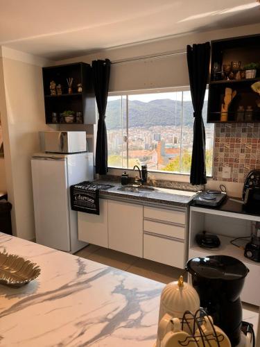 Flat Bambu - Centro - Vista Maravilhosa com Garagem e Elevador, Poços de Caldas (foto 10)