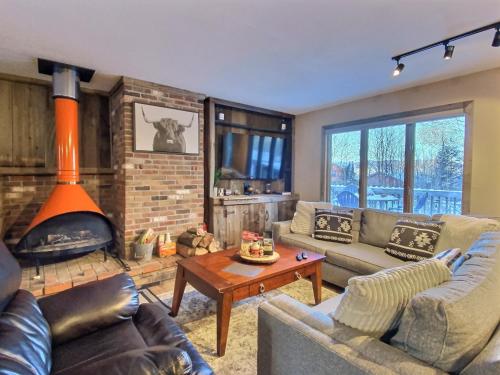 The Big Lebearski Central AC Hot Tub FirePit in Killington, USA