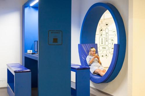 Koplietošanas atpūtas telpa ar TV, Youth Hostel Proteus Postojna in Postojna