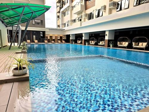 Condo Suite at BE Residences - Tap to explore photos