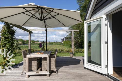 Сад, OV072 Exklusives 4P-Ferienhaus in bester Lage in Giethoorn in Гісорн