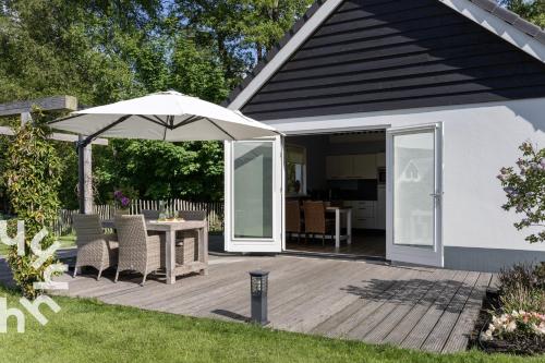 Сад, OV072 Exklusives 4P-Ferienhaus in bester Lage in Giethoorn in Гісорн