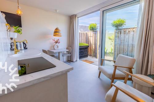 Luxe Tinyhouse Domburg, midden in het centrum en toch rustig gelegen in 棟堡