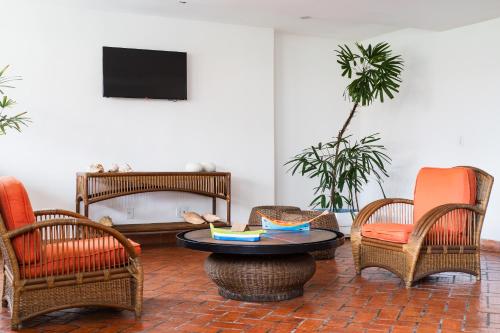Shared lounge/TV area, Pousada Porto Fino in Centro