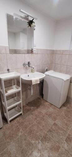 Rigófészek Apartmanház