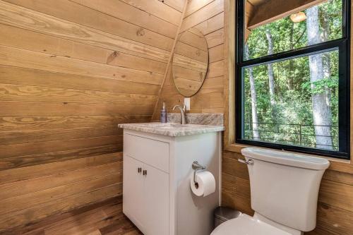 Modern A-Frame Cabin by Rip Van Winkle with Hot Tub in New Iberia, USA