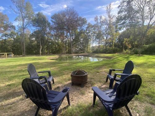 Modern A-Frame Cabin by Rip Van Winkle with Hot Tub in New Iberia, USA