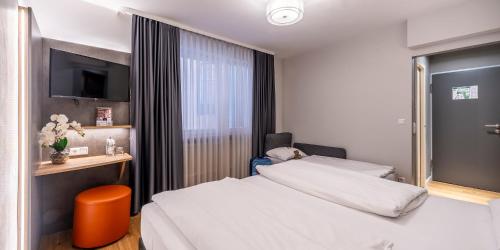 PLAZA INN Rieker Stuttgart Hauptbahnhof Room Type - Comfort Triple Room