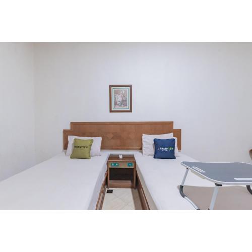 Collection O 1452 Hotel Utari Room Type - Delxue Twin Room