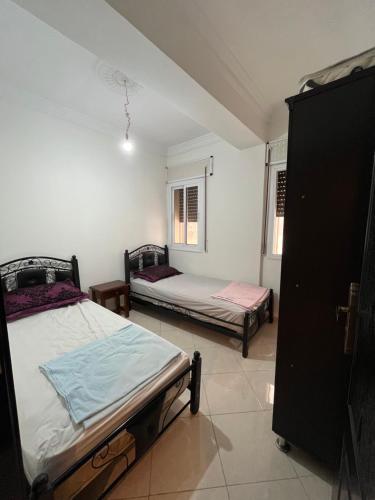 Two-Bedroom Apartment room in Family home in Gzenaya
