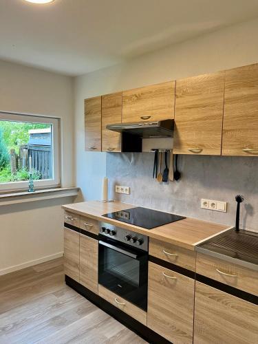 virtuve, Modernes Apartment Westerwaldsteig mit Balkon und Klima in Brandscheid