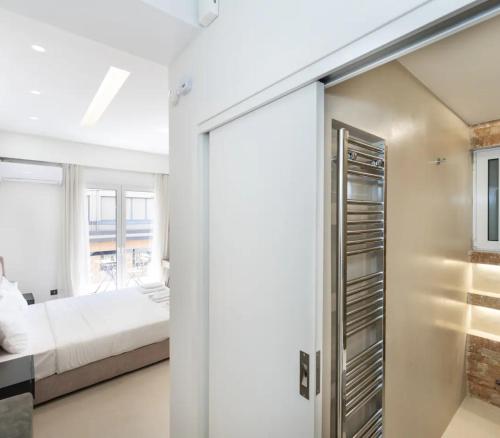 Minimal Studio with Balcony in Pagrati Athens - main image