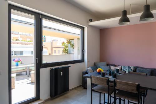 Penthouse with Panoramic Terrace -3 Min to Metro A, Rome (photo 3)